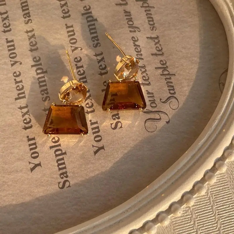 Par de Brincos Âmbar Solar